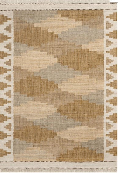Jute rug with stepped geometric shapes in cream, beige and muted grey and a cream patterned border